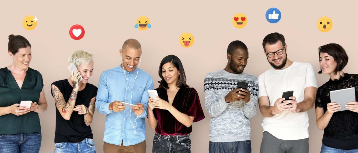 happy-diverse-people-using-digital-devices